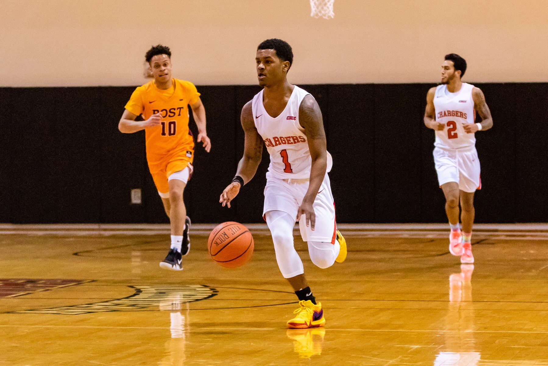 MEN'S BASKETBALL EDGED BY NEW HAVEN