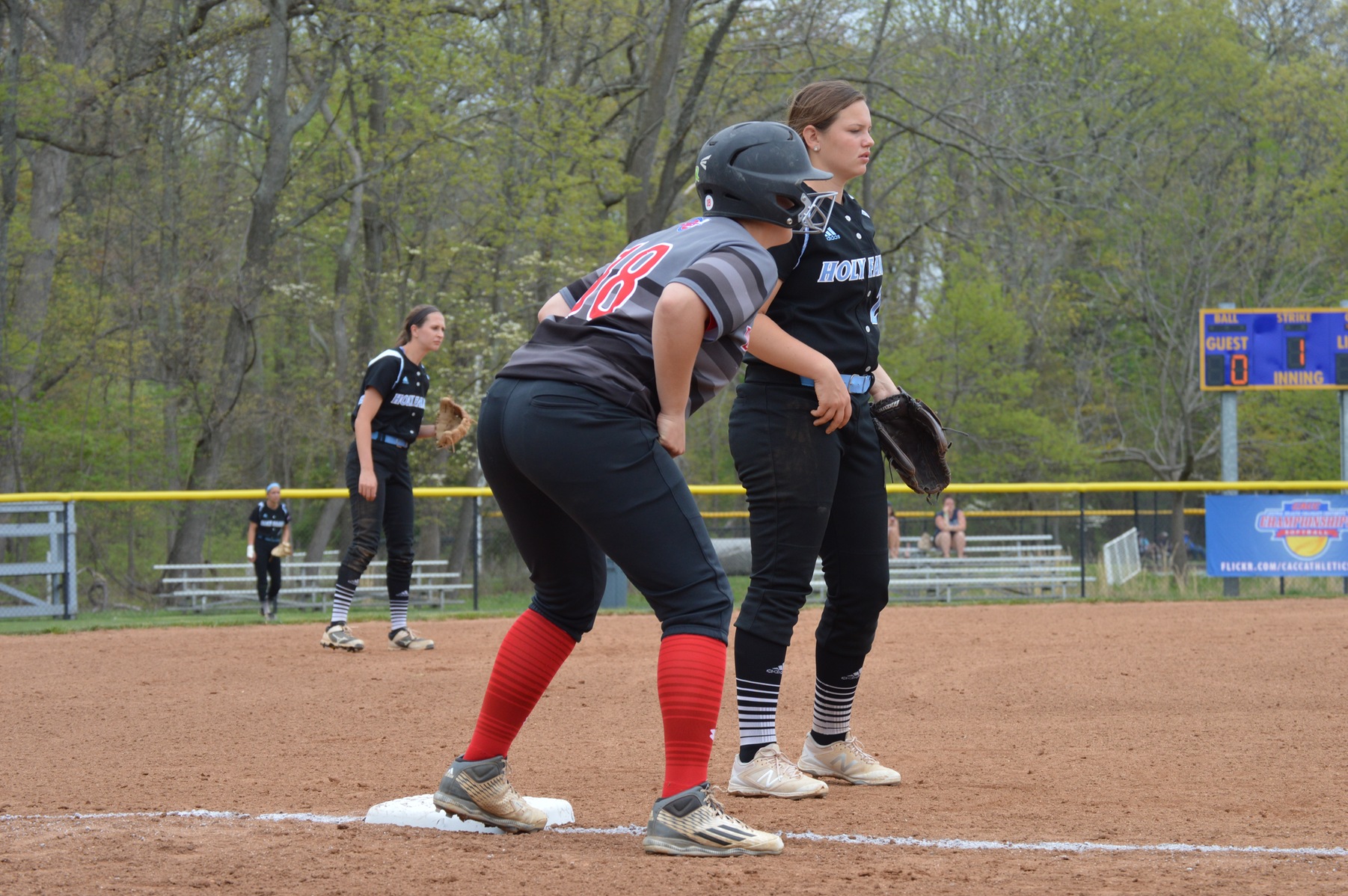 SOFTBALL SWEPT BY COUGARS