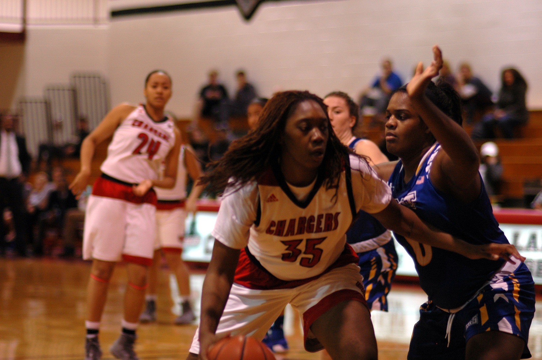 LADY CHARGERS VICTORIOUS OVER QUEENS COLLEGE KNIGHTS